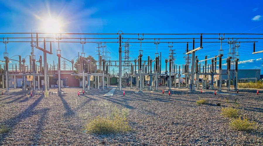 electricity transformation centre, power station, electricity distribution point, electricity network, sunset sun rays, horizontal